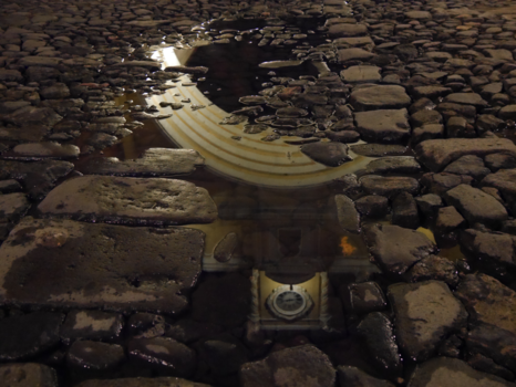 Antigua - Cobblestone streets reflection