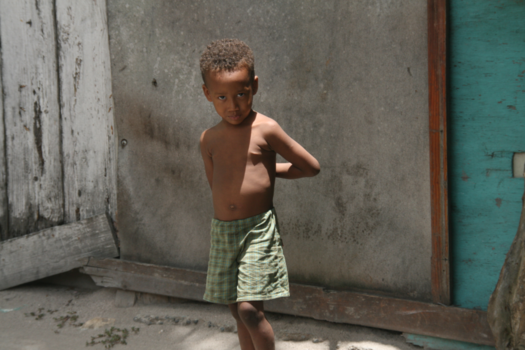 Dominicaanse Republiek - Beautiful and curious little boy, living on Saona Island with his grandparents.